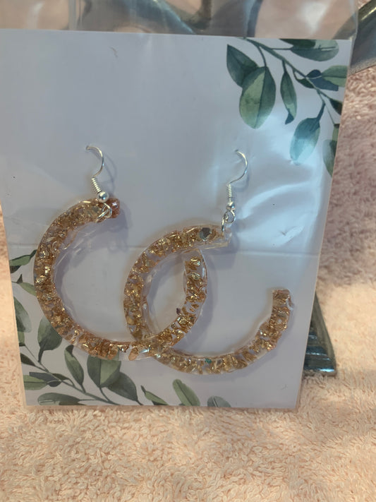 Curve's of gold sparkles'  earrings